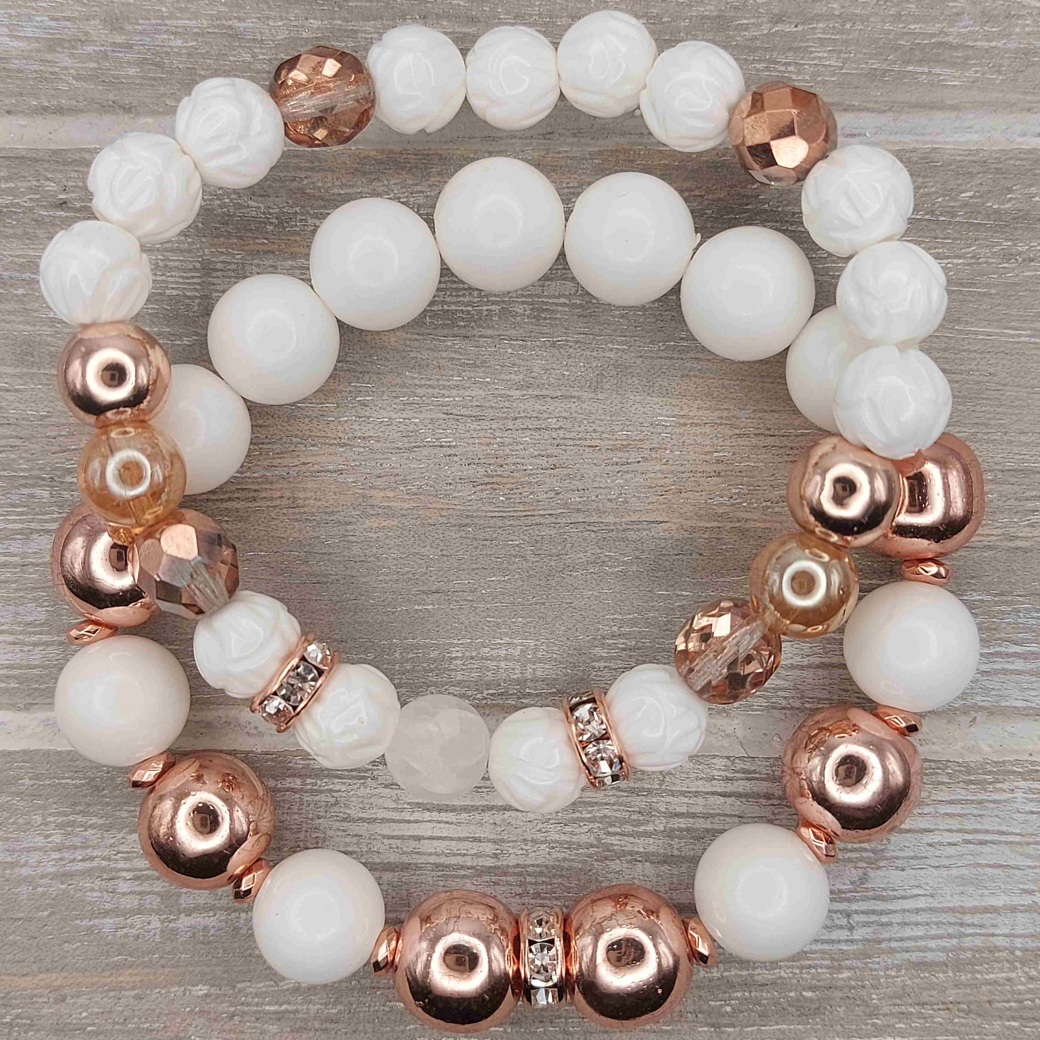 Lótuszvirág faragású kagylóhéj és rosegold hematit ásvány karkötő páros galéria kép